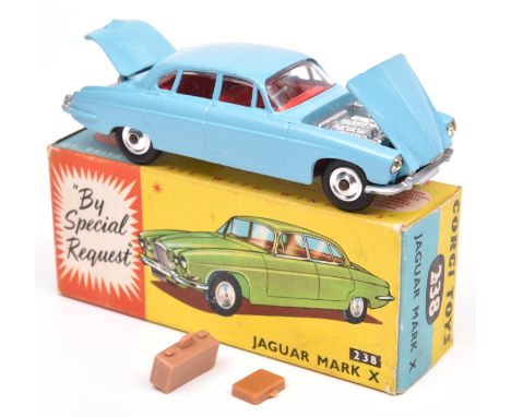 Corgi Toys Jaguar Mark X (238). In light blue with red interior, dished spun wheels with black tyres. Boxed, minor wear, with