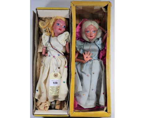 2 Pelham Puppets. 2 Ballet Dancer SL one in a pale blue sequined ball gown and another similar in cream. Both boxed, some wea