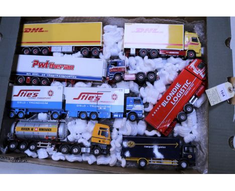 6 Tekno etc trucks. MAN TGA26.430 tractor unit with skeletal trailer with tanker load, Bertschi AG Swiss livery. Volvo FH rig