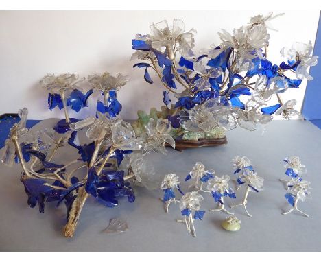 An early to mid-20th century Chinese table centre set for restoration; modelled as flowers and leaves in blue and clear glass