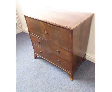 A 19th century (with adaptions) mahogany side cabinet; the reeded edge top above two doors further over two full-width gradua