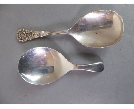 Two silver caddy spoons: Birmingham 1956, maker's mark J.B.C.&amp;S. and Sheffield 1922, maker's mark T.B.&amp;S. (27.6g)