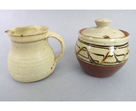 Two pieces of Studio pottery to include a small Winchcombe Pottery jug, possibly by Nina Davies, and one further jam/marmalad