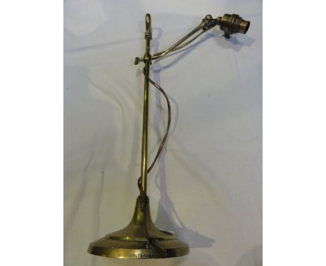 An early 20th century brass desk lamp with adjustable stem and angle poised neck stamped with registration number, 50 cm tall