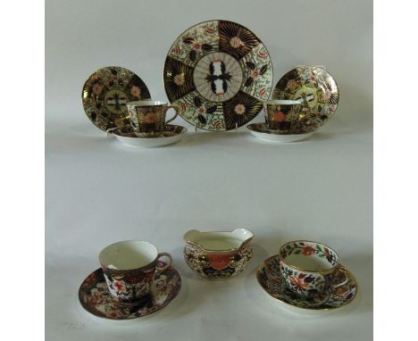 A collection of 19th century Imari pattern tea wares with painted and gilded floral and wheat ear decoration including exampl