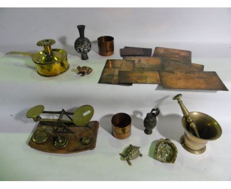 A selection of metalwares to include vintage postal scales with six associated graduated and brass weights, a copper model of