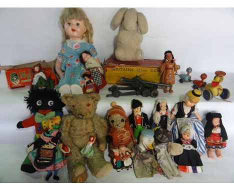A large quantity of vintage toys to include a boxed Britains 155MM gun, a boxed Myfanwy Welsh dressed doll, a timber assembly