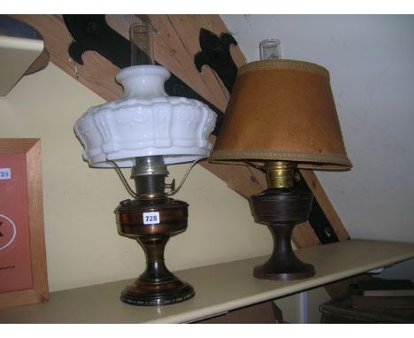 Two Aladdin table lamps including one anodised copper font and stand with model 12 burner plus chimney, an opaline chance gla