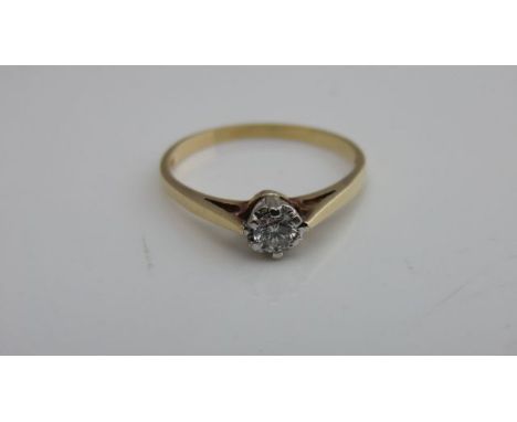 A solitaire diamond ring, claw-set with a round brilliant-cut diamond weighing approximately 0.22cts, in 18ct white and yello