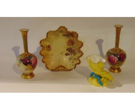 A pair of Royal Worcester vases with slender drawn necks and painted pink and red rose decoration and with puce printed marks