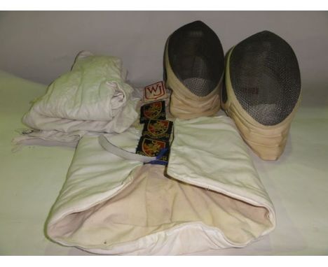 Vintage fencing accessories to include two mesh fronted helmets, a jacket by Paul 14 New North Street, London WC1, England, m