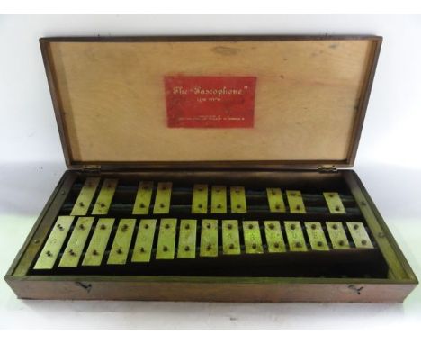 A vintage cased 'the Pascophon' low pitch, xylophone manufactured by James Pas & Co Ltd, 48 Cherry Street, Birmingham, the ca