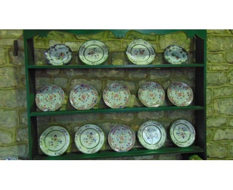 A set of six early 19th century Spode dessert plates with chinoiserie style floral decoration in pink, blue and green, with p
