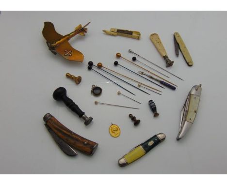 Four vintage pen knives, 19th century wax seals,  World War One Trench Art aircraft - the fuselage formed from a cartridge ca