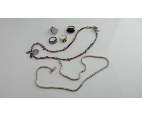 An untested tourmaline and white metal necklace; a moonstone ring, in sterling silver; a silver plated necklace; and three fu