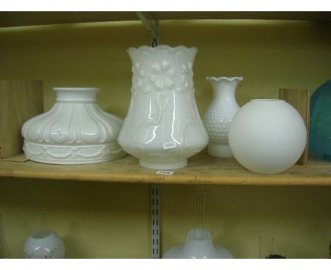 Four white glass shades, including one incandescent shade, one tall pressed glass shade suitable for a duplex lamp