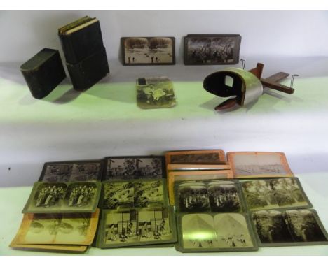 A stereoscopic viewer manufactured by Underwood & Underwood, New York together with a quantity of cards to include examples o