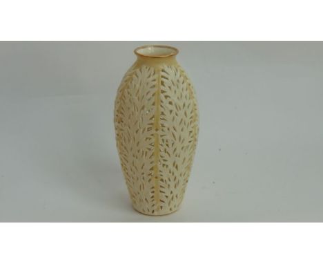 A late 19th century Graingers Worcester vase with ivory glaze and reticulated finish in the form of overlapping leaves, with 