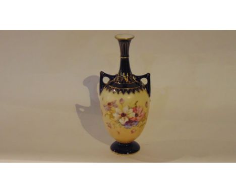 A Royal Worcester 2-handled vase with blush ivory body with painted pink, white and mauve anemone decoration and with dark bl