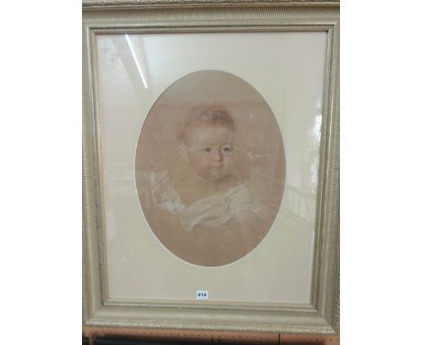 A 19th century pastel portrait of oval form showing a shoulder length study of a baby, signed bottom right J Gilbert and date