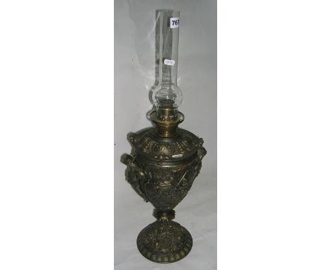 A tall vase lamp of metal base and drop fount, approximately 40cm to burner, the burner a matador type with gallery, suitable