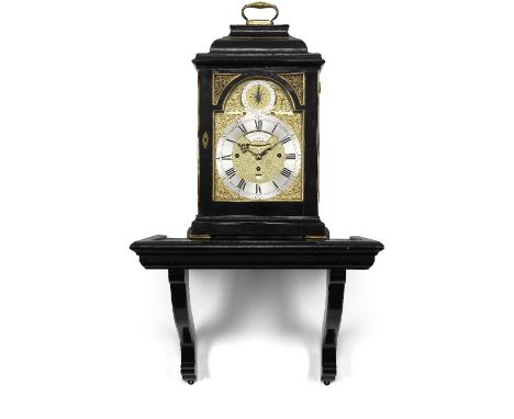 An 18th Century brass-bound ebonised two-tune table clock playing on eight bells and sixteen hammers.  Together with a later 