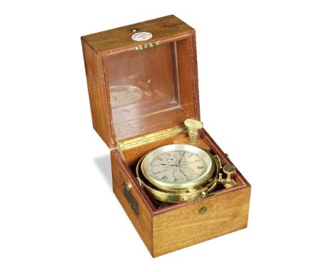 A mid-20th century mahogany two-day marine chronometer with Admiralty history of WWII use, and four related booksThomas Merce