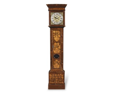 A late 17th century walnut marquetry inlaid longcase clockWilliam Clarke, LondonThe overhanging cornice on an inlaid entablat