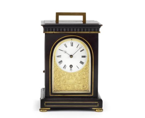 A good mid 19th century brass-inlaid ebony travel timepieceThe top with recessed campaign style handle over arched glazed sid