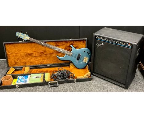 A 1980s Aria Pro II electric bass guitar, electric blue, serial no 3086012, hard cased with leads, tuner etc with Fender BXR 