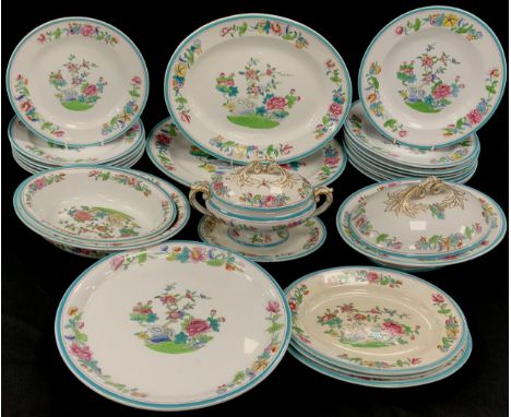 An Ashworth dinner service for eight, decorated in the Chinese Rose style including; two graduated meat dishes, eight dinner 