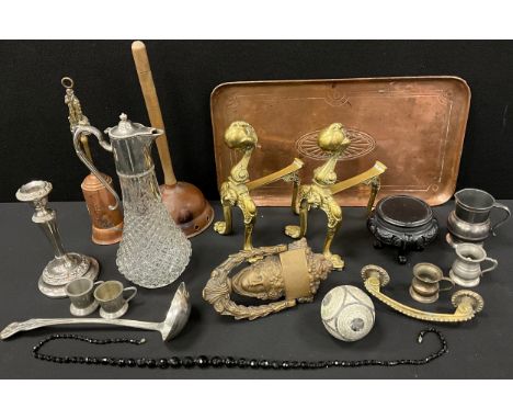 A pair of 19th century brass fire dogs, aesthetic movement brass door knocker, copper tray, pewter measure, mirror, interesti