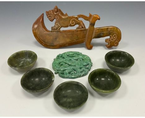 A set of five Chinese export ware soapstone miso bowls, 5cm diameter; a soaptone carving, of a dagger mounted with a lion, 16