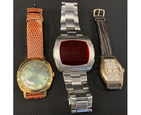 Watches - a 1930’s Elgin divers watch, stepped tonneau shaped gold plated case, silver dial, angled magnification crystal, Ar