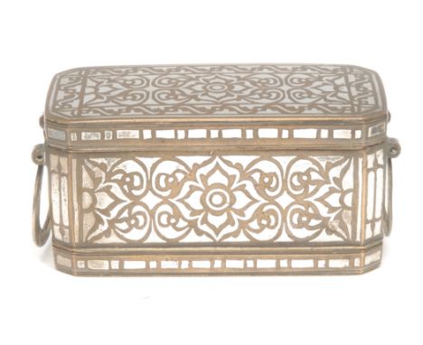 A Philippines silver inlaid brass betel box, of canted rectangular shape, the hinged cover decorated in the Islamic manner an