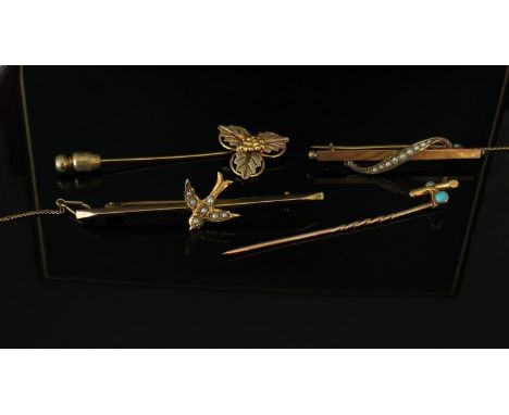 Two gold bar brooches including swallow and three tone leaf brooch with two stick pins, 6.8g