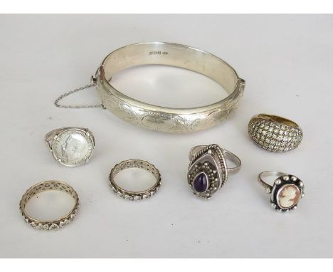 A silver stiff hinge bangle, Poison ring, cameo ring etc