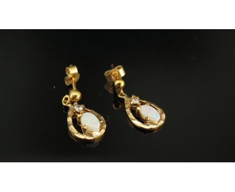 A pair of gold opal and diamond chip drop earrings, 1.3g