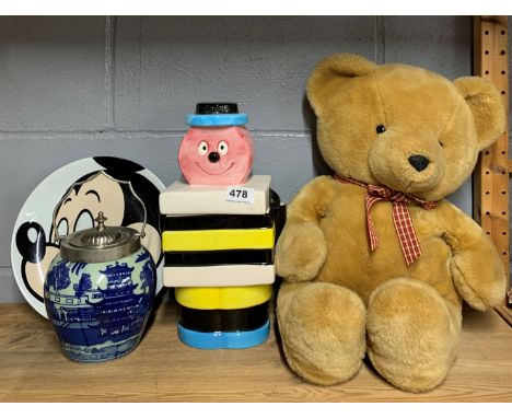 A large Bertie Bassett ceramic biscuit barrel, H. 33cm. Together with a further biscuit barrel, mickey mouse plate and a tedd