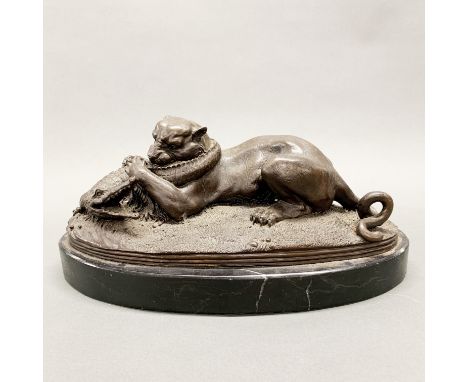 A bronze figure of a tiger fighting a crocodile on a marble base, L. 40cm.