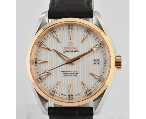 Standard VAT OMEGA; a gentleman's Seamaster Master Co-Axial wristwatch with date aperture, rose gold coloured bezel, stainles