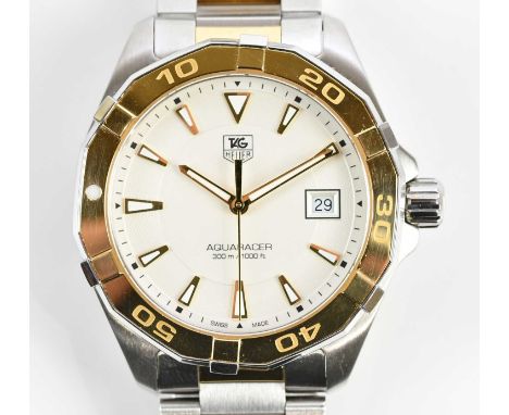 Standard VAT TAG HEUER; a gentleman's stainless steel Aquaracer wristwatch, with date aperture to the circular dial, bimetall