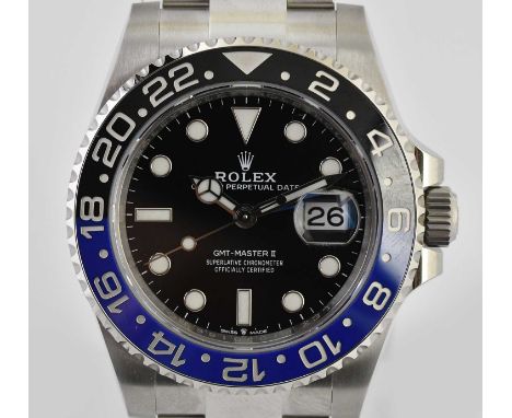 Standard VAT ROLEX; a gentleman's Oyster Perpetual Date GMT-Master II 'Batman', with black dial, blue/black bezel, Oyster bra
