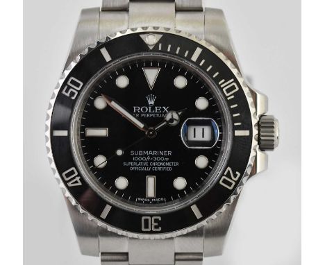 Standard VAT ROLEX; a gentleman's Oyster Perpetual Date Submariner wristwatch, with black bezel and black dial, with Oyster b