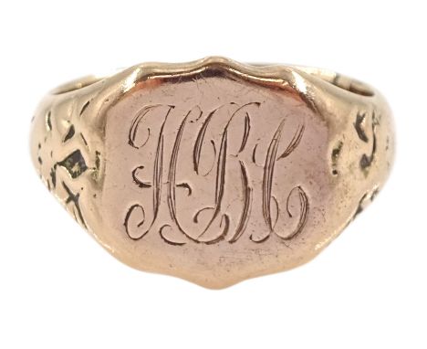 Early 20th century 9ct rose gold shield design signet ring, with engraved monogrammed initials, Chester 1921Condition Report: