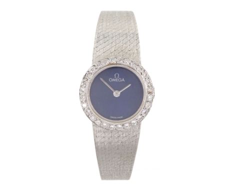 Omega ladies 18ct white gold manual wind wristwatch, Cal. 625, blue dial with round brilliant cut diamond bezel, on integral 