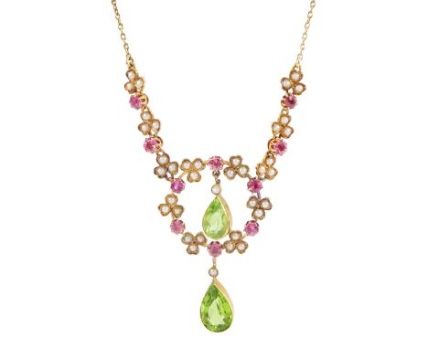 Early 20th century 15ct gold peridot, pink tourmaline and seed pearl necklace, two pear cut peridot drops, suspending from ci