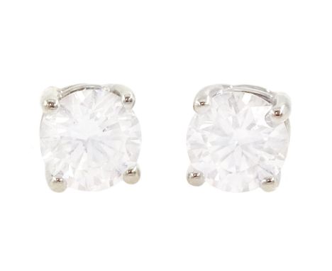 Pair of 14ct white gold round brilliant cut diamond screw back stud earrings, total diamond weight approx 0.30 caratCondition