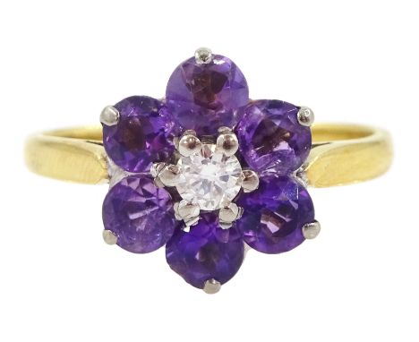 Gold round cut amethyst and round brilliant cut diamond flower head cluster ring, stamped 18ctCondition Report:Approx 2.9gm, 