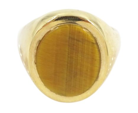9ct gold tiger's eye signet ring, London 1973Condition Report:Approx 10.45gm, size U-V, max depth = 10.5mm, some light scratc